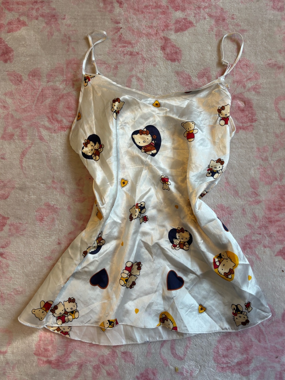 Hello Kitty white satin slip cami with repeating cartoon characters and hearts